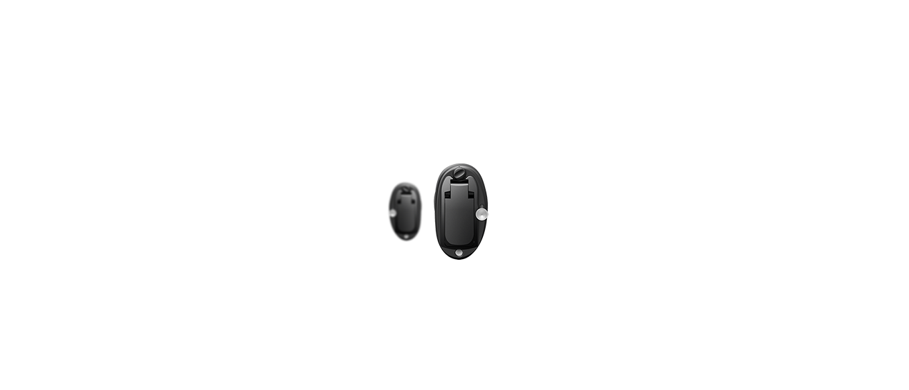 Black version of Bernafon's Alpha IIC binaural hearing aid.